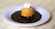 plated fried ice cream with fancy syrup